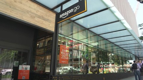 Seattle, Washington/USA - May 6, 2019. Amazon Go is a futuristic store with no checkout required. Sensors automatically detect purchases, customers just walk out and payment goes to mobile phone app.