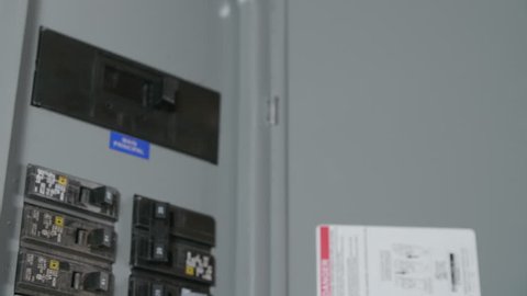 Switches in Circuit Breaker Box CLOSE UP SLIDE RIGHT