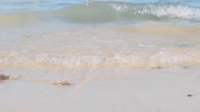 Video Slow Motion ,Soft wave of blue ocean on sandy beach