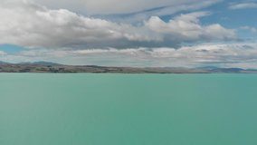 4K Aerial footage of Lake Pukaki with wave and Turquoise lake , New zealand by drone.
