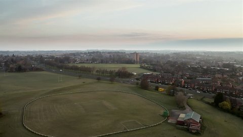 Aerial Flyover of Chapeltown, Leeds at Dawn on Sunny Spring Day