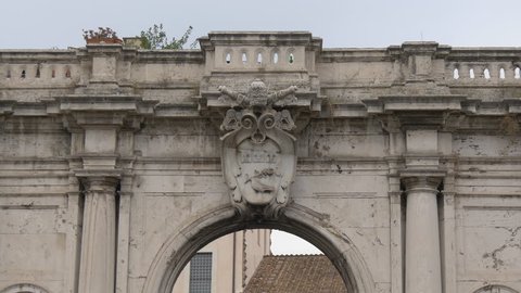 Italy, Rome - September, 2016: Coat of arms on Porta San Giovanni