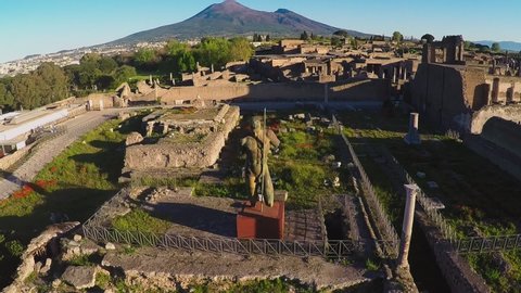 Aerial top down view gaining altitude above Pompeii