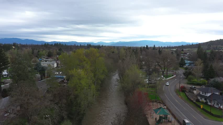 Aerial view of small town and creek in Oregon