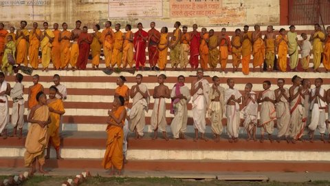 Varanasi / India 23 April 2019 Students of Sanskrit Gurukul in saffron costume praying on Varanasi Ghat   of Uttar Pradesh 