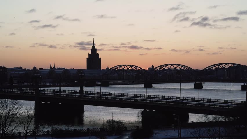 The Railway Bridge (Latvian: Dzelzce?a tilts) is a bridge that crosses the Daugava river in Riga, the capital of Latvia. Time lapse.