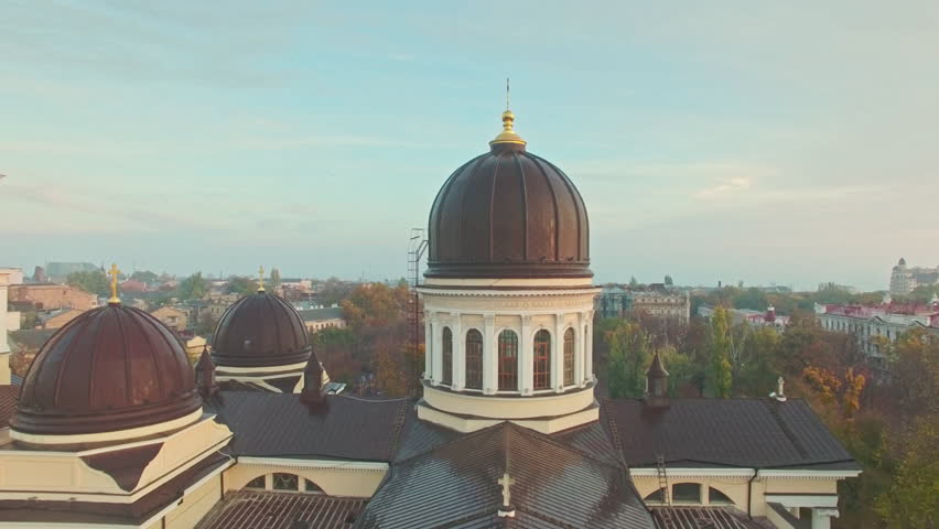 Cinematic aerial view of Transfiguration Cathedral and Odessa city center
