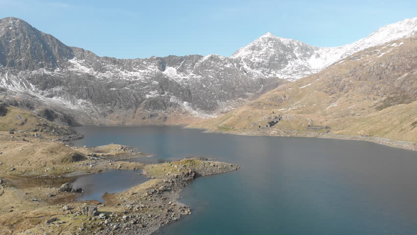 Rising Wide Aerial Mount Snowdon Over Lake.