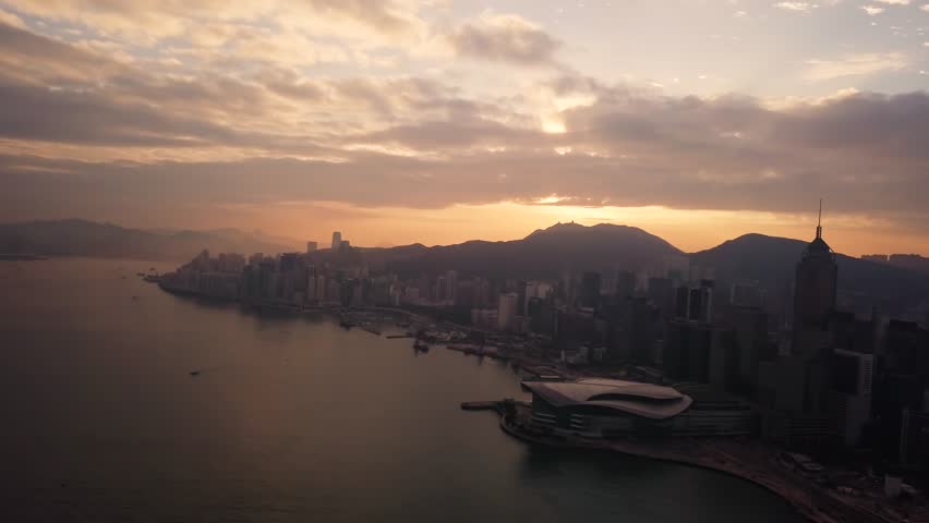 Aerial View drone 4k footage Of Modern Skyscrapers In Hong Kong City. buildings in Hong Kong city on sunrise. Royalty-Free Stock Footage #1029285767