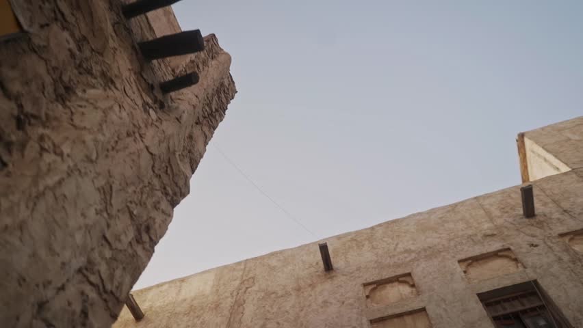 Smooth slow motion low angle movement with old heritate buildings in Souq Waqif in Doha, Qatar