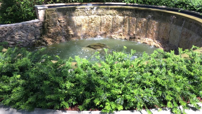 Dallas Arboretum-  peaceful bubbling water flow surrounded by foliage