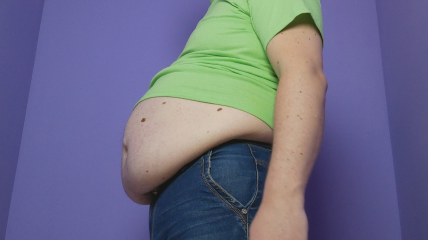 142 Fat man tight pants Stock Video 