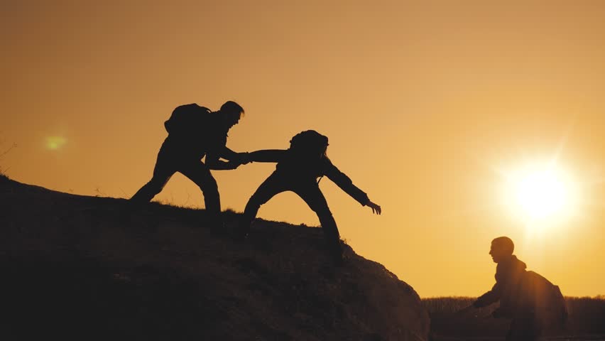 teamwork. help travel silhouette concept. group team of tourists lends helping hand climb the cliffs mountains. adventure people teamwork climbers climb business to top helping hand hardships path Royalty-Free Stock Footage #1029308651