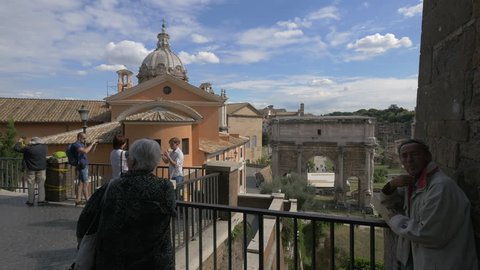 Italy, Rome - September, 2016: Taking pictures of the Roman Forum ruins in Rome