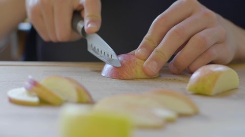 Cutting an apple. . .