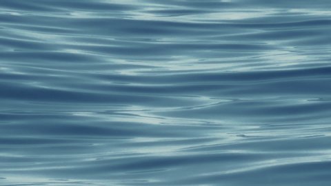 Close up of sea wave. Texture of water surface, Slow motion.