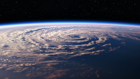 4K. Big Hurricane In The Rays Of The Rising Sun. Amazing View Of Planet Earth From Space. Ultra High Definition. 3840x2160. Realistic 3d Animation. (You Can Speed Up This Animation For Your Projects).