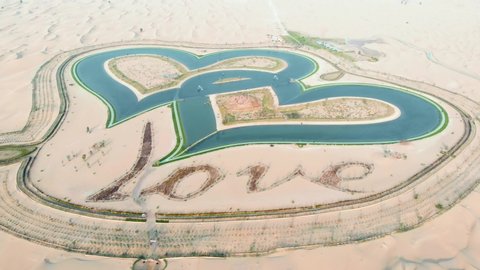 Heart shape Love lakes in Dubai desert aerial footage view