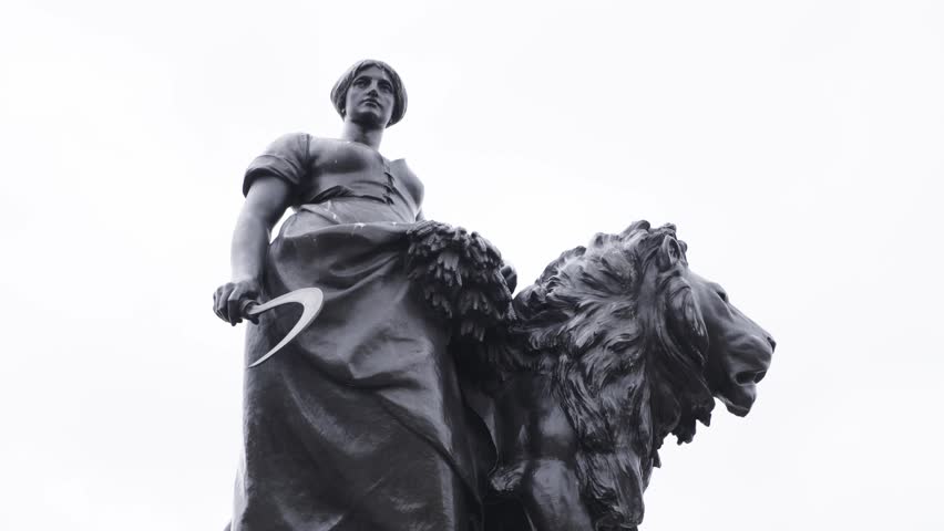 Goddess statue with lion next to her | SLOW MOTION