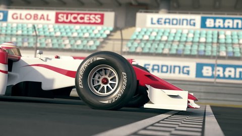 Side view of a generic formula one race car driving across the finish line in slow motion - close-up front wheel - realistic high quality 3d animation