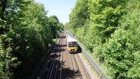 Chiltern Line Class 165 Turbo diesel train in Rickmansworth, Hertfordshire travelling on the London Marylebone to Aylesbury route