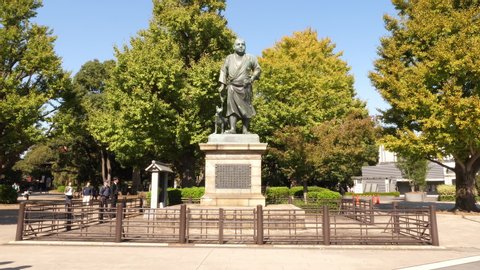 TOKYO, JAPAN - 2018 circa:The Saigo Takamori and his dog bronze statue in Ueno Park
