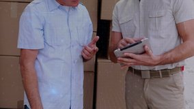 Close up of a Caucasian delivery man with his Caucasian manager looking into a clipboard behind a delivery van. Digital program codes are running in the foreground. - Powered by Shutterstock - Get 15% off with code: PIKWIZARD15
