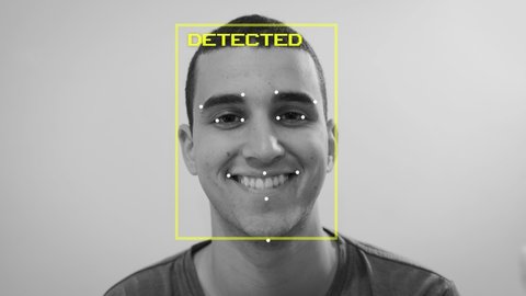 Man has his face and emotion detected by artificial intelligence as happy - computer learning mechanism and digital face recognition identity biometric scan predict human emotional current state