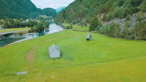 Aerial landscape view mountain river Norway, in summer sunny day with blue sky, Drone 4K Video