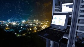 smart city concept. monitor show graph information of network traffic and blending with particles, glittering particles. Connection and mesh dots and night cityscape background - Powered by Shutterstock - Get 15% off with code: PIKWIZARD15