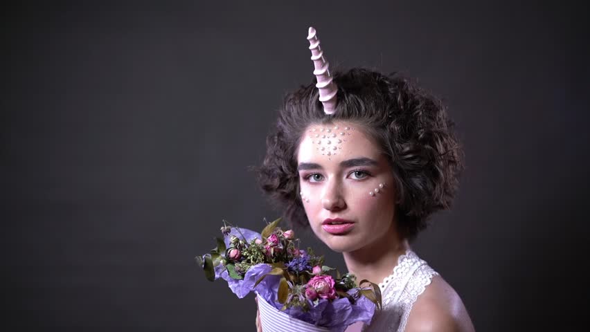 portrait of a beautiful girl with beads, beauty shooting