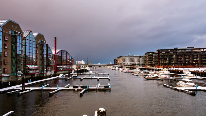 Trondheim, Norway. City center of Trondheim, Norway during the cloudy winter day. Time-lapse of modern building and grey cloudy sky