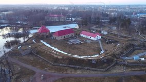 Ancient fortress Korela close-up, April evening (aerial video). Priozersk, Russia 