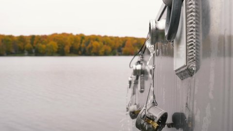 Iron River, Michigan / United States - 10 08 2018: Walleye release restocking an Upper Peninsula, inland lake during the fall colors in Michigan.