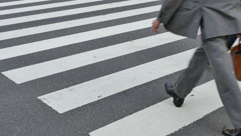 People walking at zebra crossing in Shinjuku, Tokyo, Japan Adlı Haber Amaçlı Stok Video