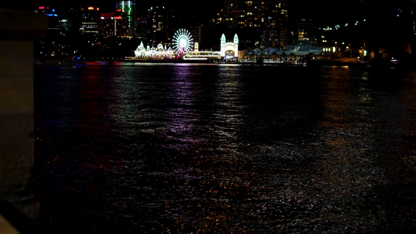 Tilt up Shot Sydney Skyline at Night