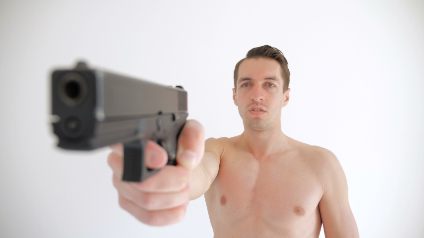 naked man aims his gun on Stock Footage Video (100% Royalty-free)  1029516155 | Shutterstock