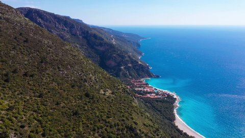 Oludeniz is a resort village on the southwest coast of Turkey. It’s known for the blue lagoon of Oludeniz Tabiat Parki and the wide, white Belcekiz Beach.