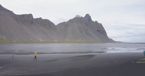 4K - Man Walking in Black Sand Beach in Iceland - EPIC VIEW