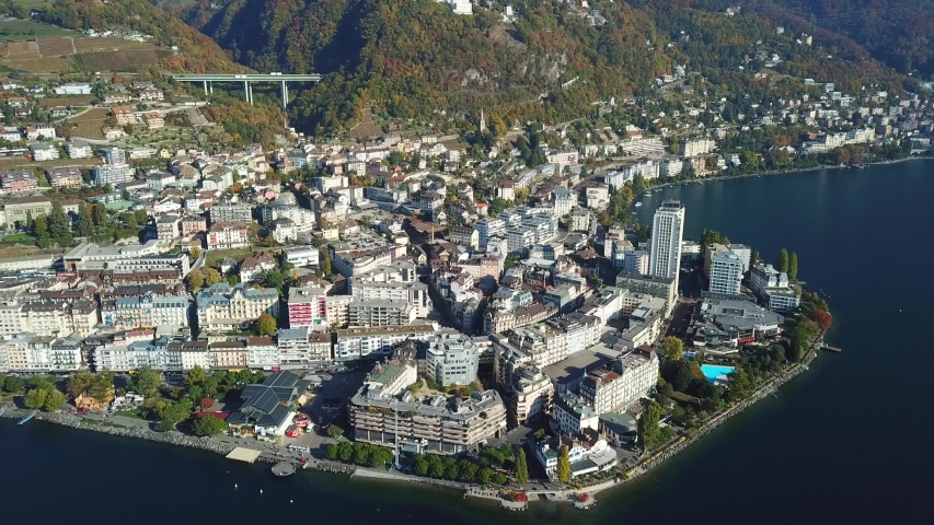 aerial shoot top view from the lake on Montreux located in the hills, Switzerland
