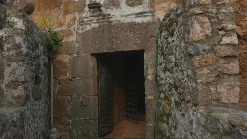 Entering to Kizil Kule tower in Alanya peninsula, Antalya district, Turkey, Asia. Famous tourist destination with high mountains. Part of ancient old Castle.