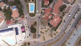 Aerial view from a drone on the highway and the road  in Castelldefels, coastal village of Barcelona, Spain. 4k Drone Video
