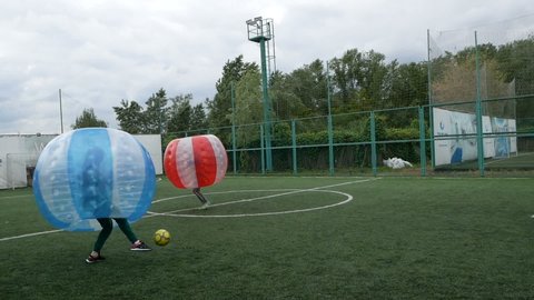 DNIPRO, UKRAINE-May 10, 2019: People play bumperball zorbsoccer outdoor. party time, May 10 2019 in Dnipro Ukraine