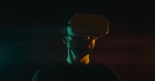 Mid shot of a male in a Virtual Reality Headset