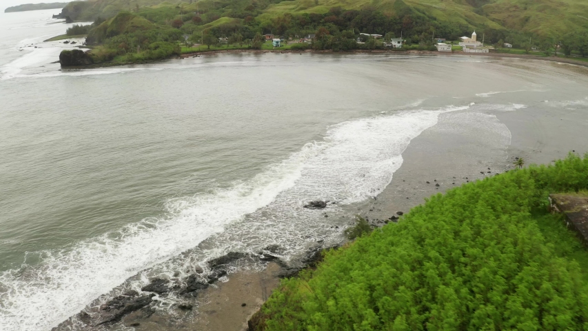 Aerial footage of a ocean bay in Guam