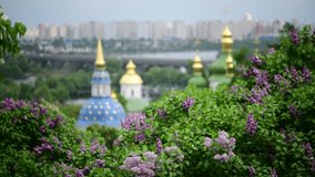 Spring Kiev panorama after the rain church blooming lilac Ukraine 4k video