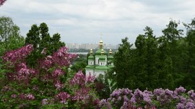Spring Kiev panorama after the rain church blooming lilac Ukraine 4k video