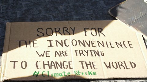 Climate Strike poster in a Meeting due Clime Change. Activists in action against the Global Warming. Fridays for Future Movement.