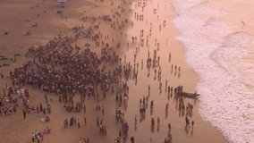Sunset at the ocean beach, Puri, Orissa, India, 4k aerial drone footage