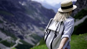 Caucasian hipster girl wanderlust using smartphone for making picture during journey vacation in mountains,positive female tourist shooting video on mobile phone camera while discovering National Park